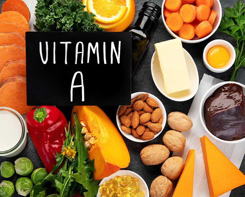 Food rich in Vitamin A on a dark background